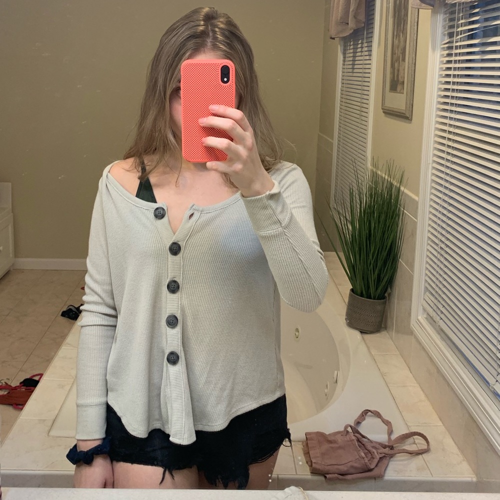 beige button down sweater
